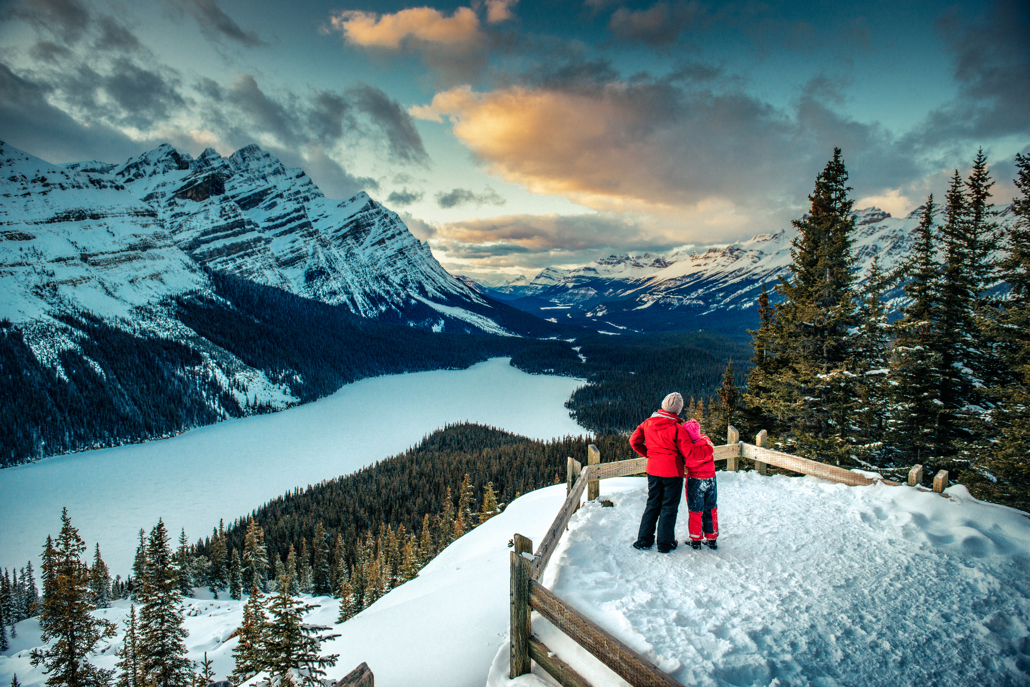 Mother And Daughter Enjoying Banff National Park In Winter